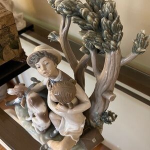 Lladro Porcelain Figurine with Boy and Dog retired #4891. “Looking for refuge”